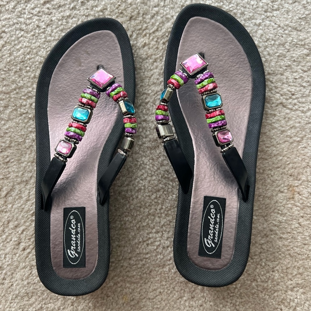 Size 9 jeweled flip flops - never worn